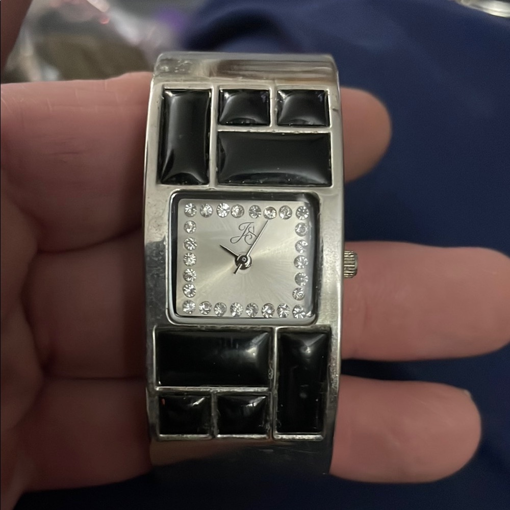 Stylish Black and Silver Watch with Square Face and Geometric Band